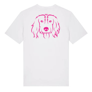 Magenta outline illustration of the head of a Spaniel on the back of a white unisex t-shirt